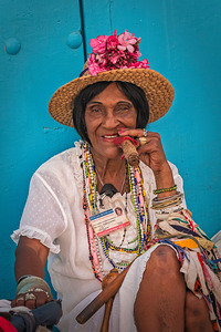 Lady in White With Cigar