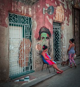 Street Conversation by the Mural