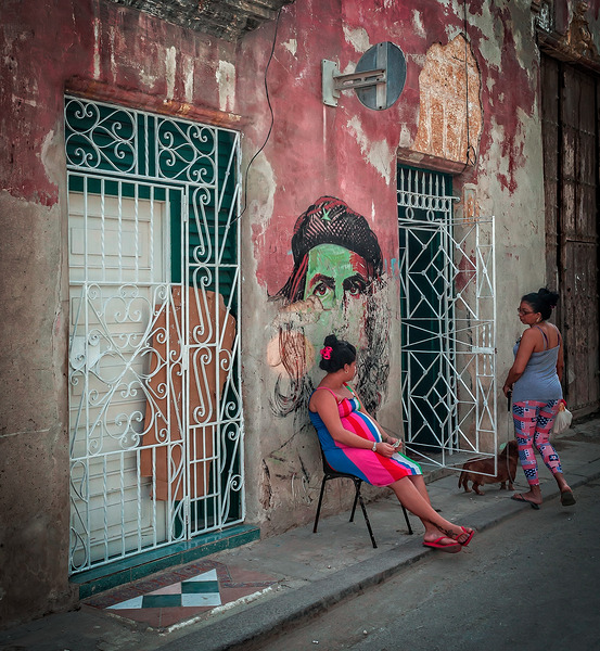 Street Conversation by the Mural Print