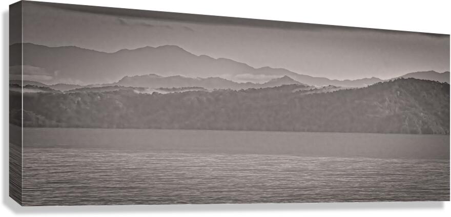 Mountain Silhouettes Over Still Water Canvas Print