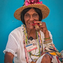 Lady in White With Cigar