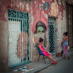 Street Conversation by the Mural