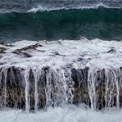 Ocean Wave Over Rock Shelf