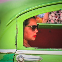 Woman in Green Car Window